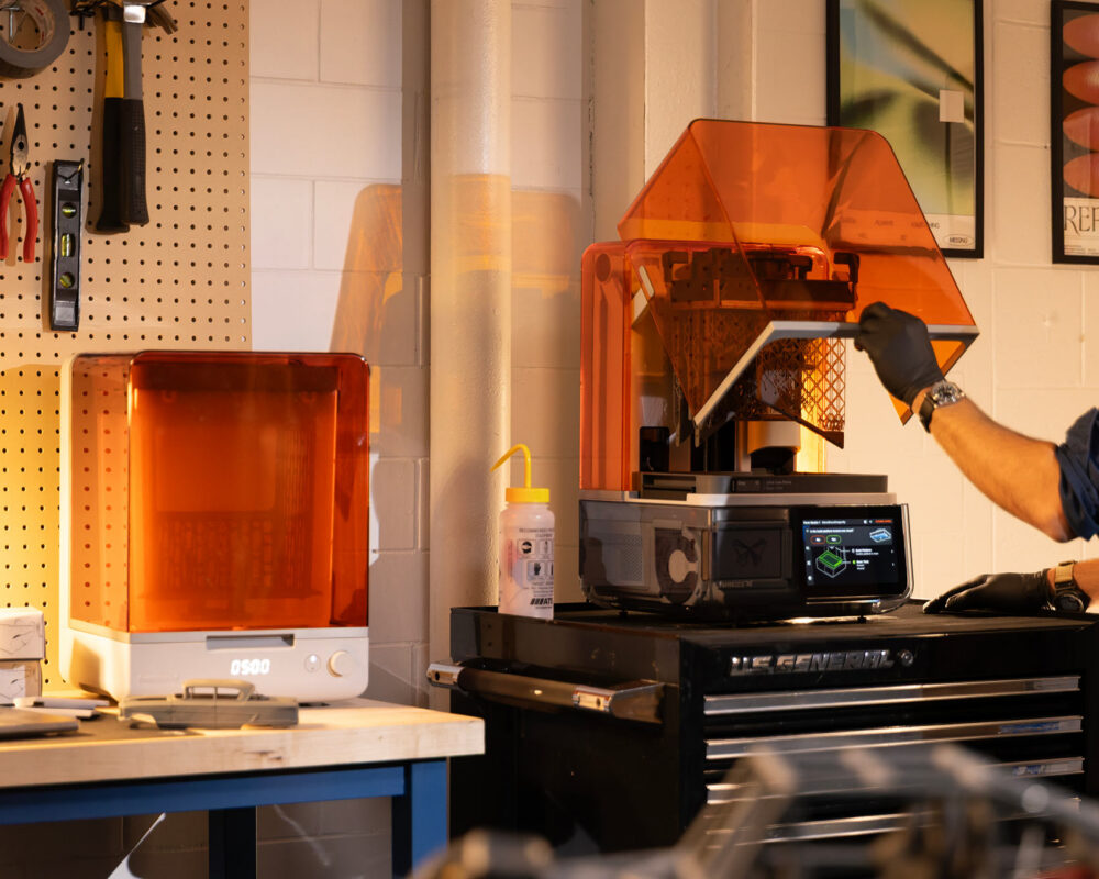 Man in studio prototyping parts on the formlabs form studio